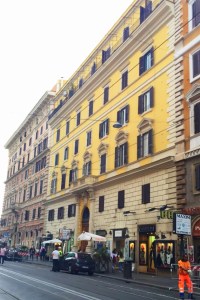 My sunshine yellow apartment building